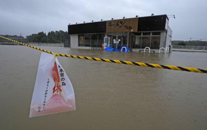 The area around a ramen restaurant is flooded by heavy rain as Typhoon Dujuan approaches, in Oamishirasato, Chiba Prefecture, Japan, September 21, 2026 in this photo taken by Kyodo.