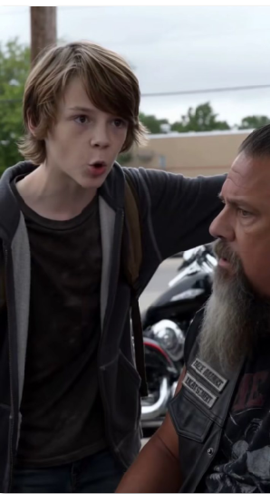 Homeless Boy Whispered to a Hells Angels Biker, "That SUV Is Watching the Kids" — Seconds Later, 20 Bikers Moved